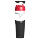 "NomShaker" mit rotem Deckel, Siebeinsatz und schwarzem Behälter für bessere Mischung."